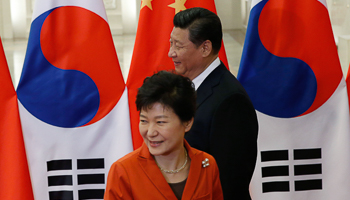 Park Geun-hye walks next to Xi Jinping on the sidelines of the APEC meetings in Beijing (Reuters/Kim Kyung-Hoon)