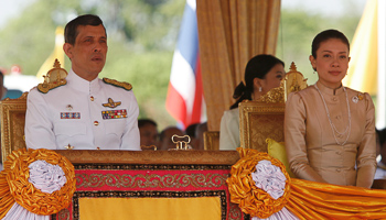 Crown Prince Maha Vajiralongkorn and Royal Consort Princess Srirasmi watch the royal ploughing ceremony in Bangkok (Reuters/Chaiwat Subprasom)