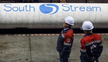 Employees stand near South Stream pipes at the OMK metal works in Vyksa in the Nizhny Novgorod region, Russia (Reuters/Sergei Karpukhin)