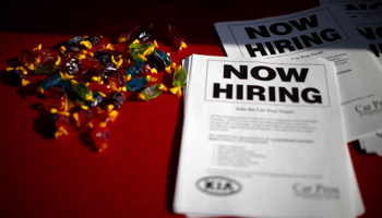 Leaflets lie on a table at a booth at a job fair in California (Reuters/Lucy Nicholson)