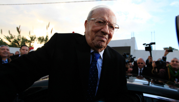 Beji Caid Essebsi, leader of Tunisia's secular Nidaa Tounes party and a presidential candidate, reacts after casting his vote at a polling station (Reuters/Anis Mili)