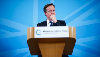 Prime Minister David Cameron listens to a question as he speaks on the economy (Reuters/Andrew Winning)