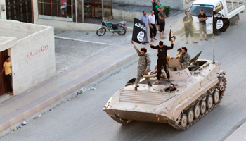 Islamic State group fighters in a military parade (Reuters/Stringer)