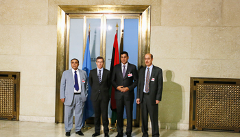 Head of UNSMIL Bernardino Leon poses with boycotters of the General National Congress (Reuters/Pierre Albouy)