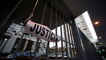 A sign reads "Justice" at the building where Nisman was found dead (Reuters/Marcos Brindicci)