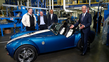 Obama and Biden look at a 3D printed Shelby Cobra car in Clinton, Tennessee (Reuters/Kevin Lamarque)