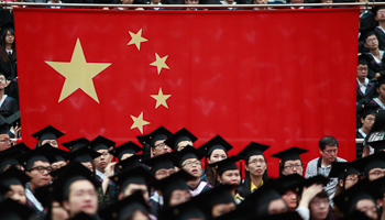 A graduation ceremony at Fudan University in Shanghai (Reuters/Aly Song)