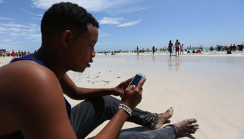 A Somali man on his mobile phone in Mogadishu (Reuters/Feisal Omar)