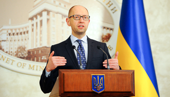 Yatsenyuk delivers a speech during a meeting in Kyiv (Reuters/Andrew Kravchenko/Pool)