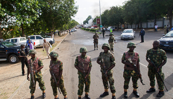 Soldiers at the scene of a blast in Abuja (Reuters/Afolabi Sotunde)