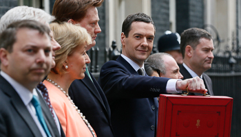 Osborne holds up his budget case outside number 11 Downing Street (Reuters/Stefan Wermuth)