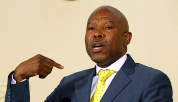 Newly appointed Reserve Bank governor Lesetja Kganyago gestures during a media briefing in Pretoria (Reuters/Siphiwe Sibeko)