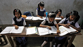 Children study at a school in Kolkata (Reuters/Rupak De Chowdhuri)