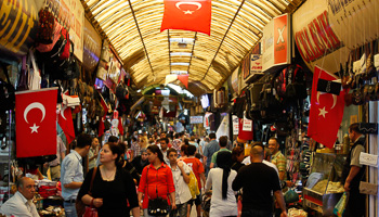 People shop in a shopping district in Hatay (Reuters/Umit Bektas)