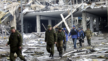 OSCE members visit the Donetsk airport (Reuters/Igor Tkachenko)