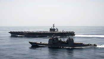 USS Theodore Roosevelt and USS Normandy operate in the Arabian Sea (Reuters/U.S. Navy)