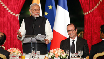 French President Francois Hollande listens to the speech of Indian Prime Minister Narendra Modi (REUTERS/Yoan Valat/Pool) 