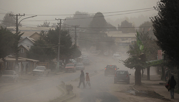 Residents wearing surgical masks to protect themselves in Curarrehue town, near Pucon city (REUTERS/Cristobal Saavedra)