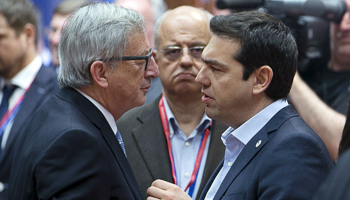 Juncker talks with Tsipras (REUTERS/Yves Herman)