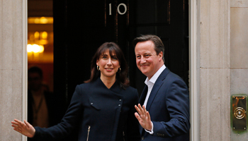 David Cameron and his wife arrive at 10 Downing Street in London (Reuters/Stefan Wermuth)