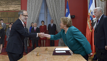 Bachelet and new finance minister Rodrigo Valdes at La Moneda presidential palace in Santiago (Reuters/Alex Ibanez/Chilean Presidency/Handout via Reuters)