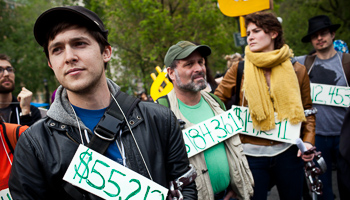 Demonstrators protesting against rising student debt in Union Square, New York (Reuters/Andrew Burton)