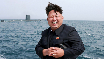 Kim Jong Un watches the test-fire of a strategic submarine underwater ballistic missile (Reuters/KCNA)