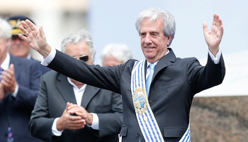 Vazquez gestures after receiving the presidential sash (REUTERS/Andres Stapff)