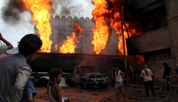 A burning fuel truck set ablaze during a clash in Yemen (Reuters/Stringer)