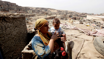 Residents of the shanty area of al-Dweiqa (Reuters/Mohamed Abd El Ghany)