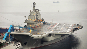 China's first aircraft carrier the Liaoning docked at Dalian Port (Reuters/Stringer)