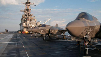 F-35s stand ready on the deck of assault ship USS Wasp (Reuters/U.S. Navy/Willam Tonacchio) 