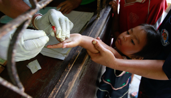 Children at a malaria clinic in Kanchanaburi Province, Thailand (Reuters/Sukree Sukplang)