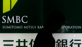 A man walks past a branch of SMBC in Tokyo (Reuters/Yuriko Nakao)