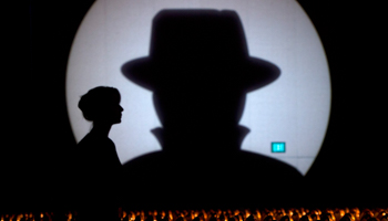 A speaker is silhouetted during the Black Hat USA 2014 hacker conference (Reuters/Steve Marcus)