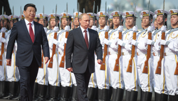Xi Jinping and Vladimir Putin at a ceremony to open the Chinese-Russian joint naval drills (Reuters/Alexei Druzhinin)