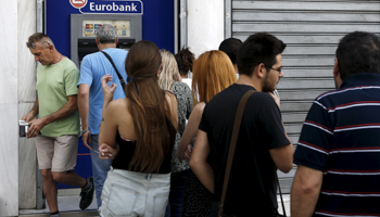 People line up to withdraw cash in Athens, Greece (Reuters/Alkis Konstantinidis)