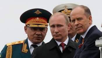 Putin, Defence Minister Sergei Shoigu and Alexander Bortnikov (Reuters/Maxim Shemetov)