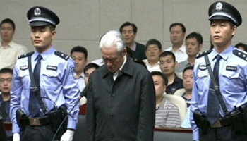 Zhou Yongkang as he listens to his sentence in a court in Tianjin, China (Reuters/China Central Television)