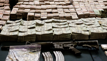 Part of the more than 41 million pesos seized from the Zetas drug cartel is displayed in Mexico City (Reuters/Henry Romero)