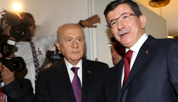 Davutoglu meets Bahceli as part of the first round of coalition talks in Ankara (Reuters/Adem Altan/Pool)
