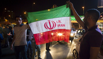 Iranians celebrate on the streets following a nuclear deal with major powers, in Tehran (Reuters/TIMA)