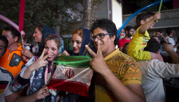 Iranians celebrate in the street following a nuclear deal with major powers, in Tehran (Reuters/TIMA)