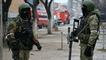 Members of Russia's special forces stand guard during an operation on suspected militants in Makhachkala, the capital of Russia's North Caucasus Republic of Dagestan (Reuters/Stringer)