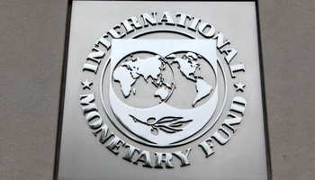 The International Monetary Fund logo at the IMF headquarters building in Washington (Reuters/Yuri Gripas)