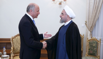 Iran's President Hassan Rouhani with minister Laurent Fabius (Reuters/President via Reuters)