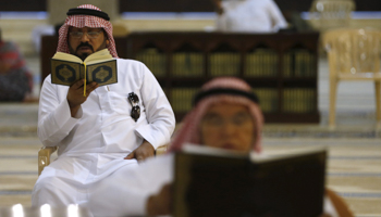 A man reads a Koran during Ramadan at the Al-Rajhi mosque east of Riyadh (Reuters/Faisal Al Nasser)