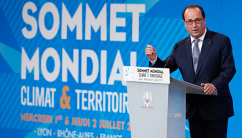 Hollande delivers a speech during the World Summit Climate and Territories in Lyon, France (Reuters/Ian Langsdon/Pool)