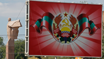 A poster with the official coat of arms in Tiraspol, in Transdniestria (Reuters/Gleb Garanich)