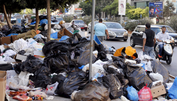 Uncollected rubbish piles up in a Beirut street (Reuters/Mohamed Azakir)